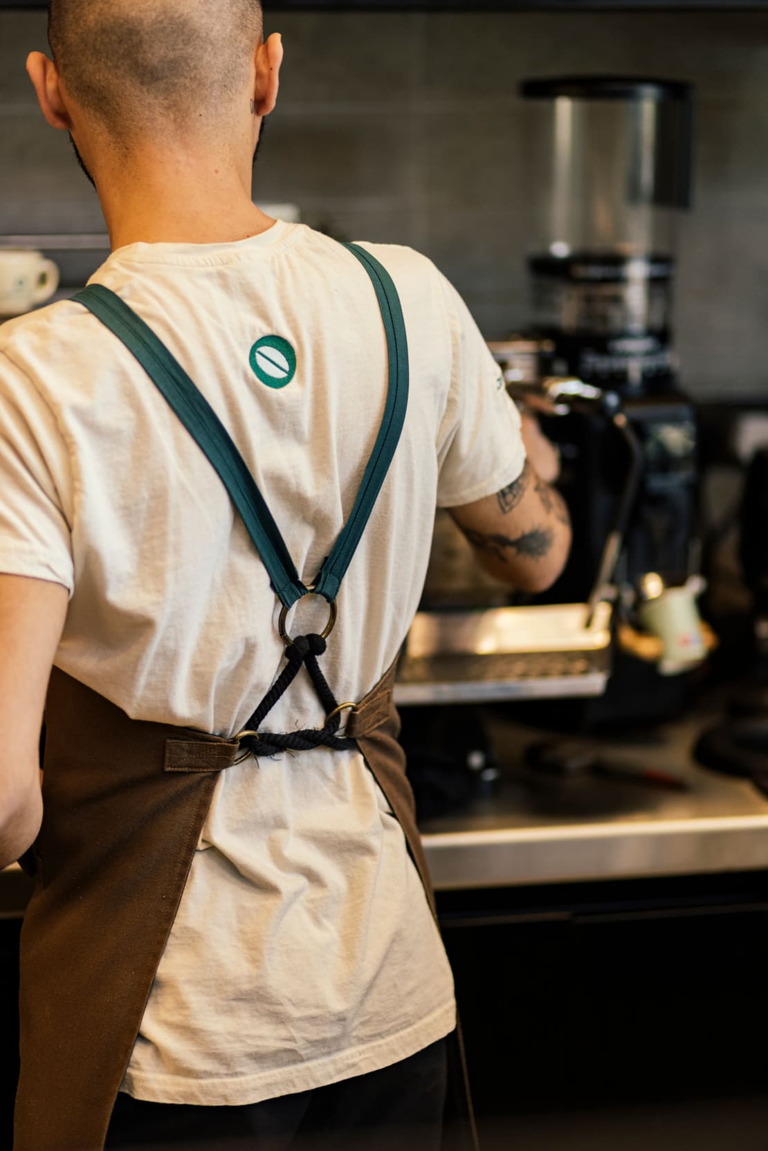 Kawacom's barista working behind the counter